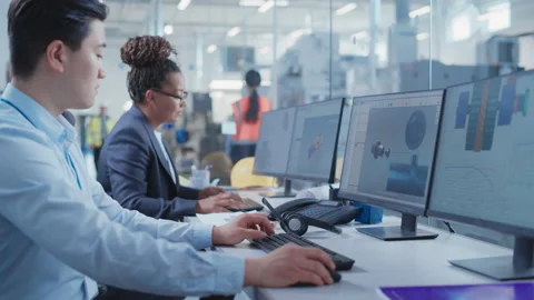 Engineer Working on Computer in Office 스톡 동영상 201508250