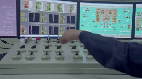 Engineer working on the control panel of an industrial plant Stock Footage 330211743