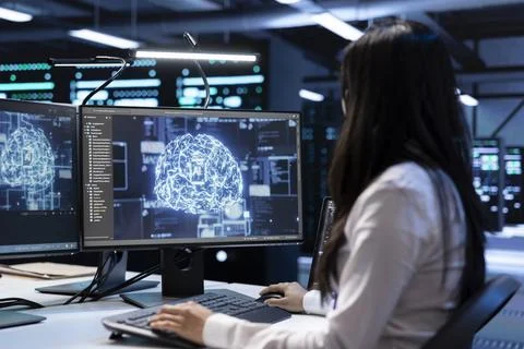 Engineer working data center using artificial intelligence tech Stock Photos