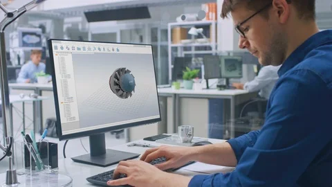 Engineer Working on Desktop Computer, Screen Showing CAD Software with 3D Engine Video stock 107790331