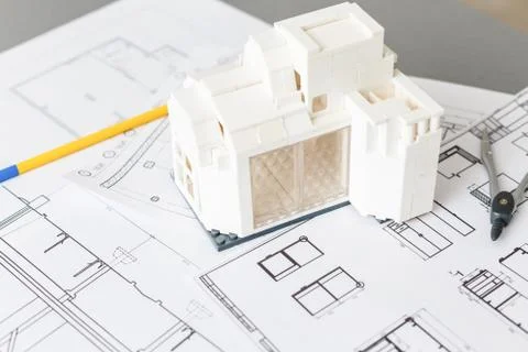 Engineer working on drawings, concept of building house Fotos de archivo