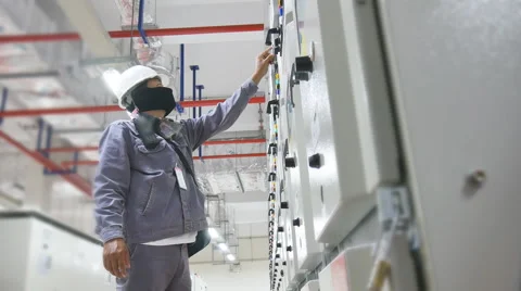 Engineer working in electrical substation Stock Footage 58742342
