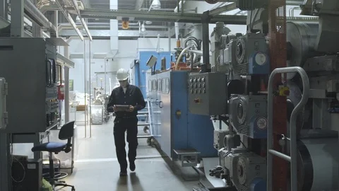 Engineer working in factory Stock Footage 106321882