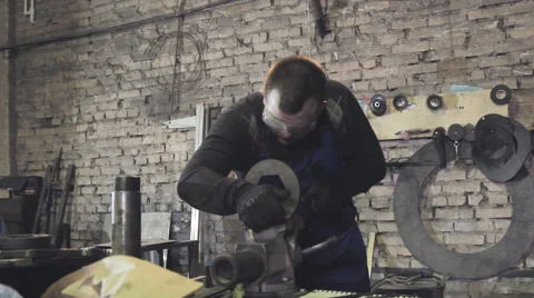 Engineer working with a file on a workbench Video stock 61971116