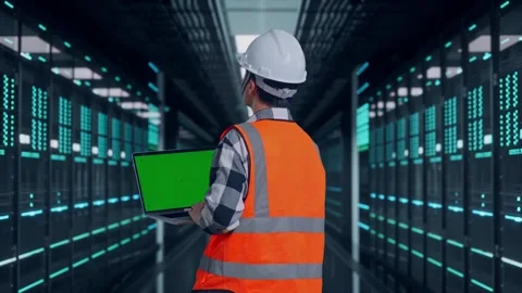Engineer Working On A Green Screen Laptop in Data Center Video stock 321991499