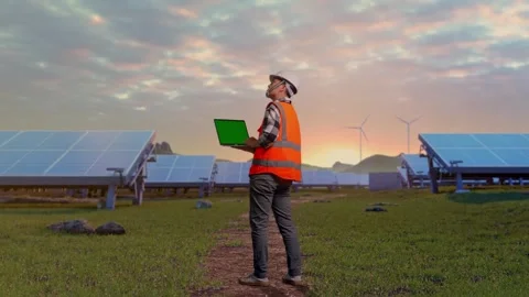 Engineer Working On A Green Screen Laptop at Energy Farm Stock Footage 331025821