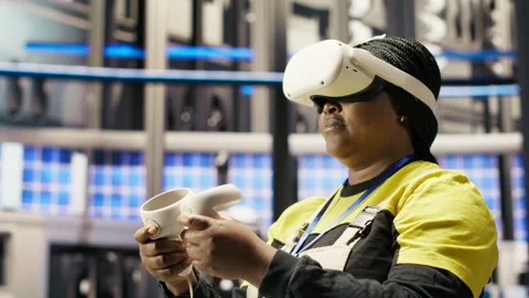 Engineer working in industry 4.0 plant using virtual reality technology Stock Footage 307365810