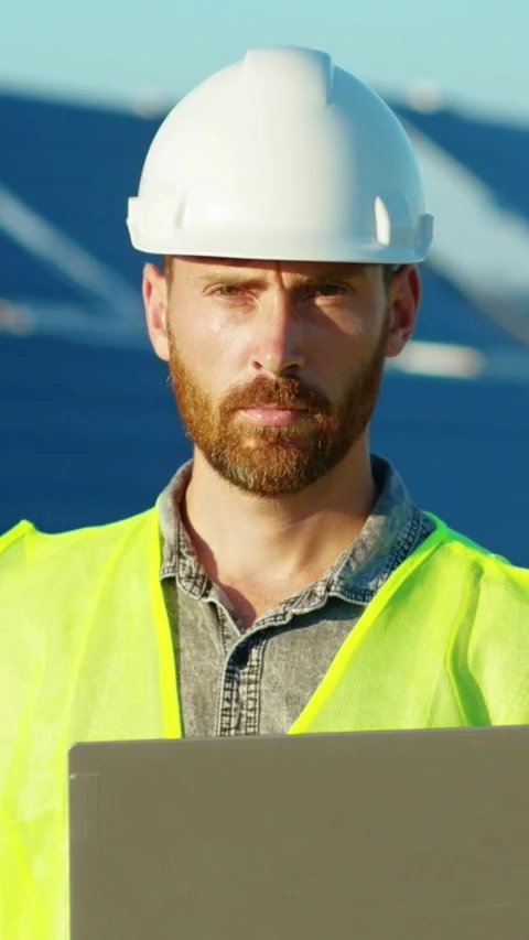 An engineer is working on an innovative solar technology project focused on Stock Footage 314206204