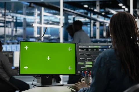 Engineer working on isolated screen desktop PC in data center Stock Photos