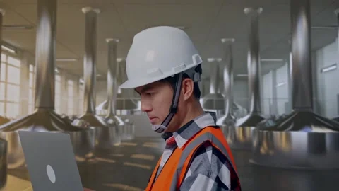 Engineer Working On A Laptop at Beer Plant Stock Footage 332545687