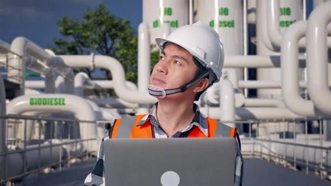 Engineer Working On A Laptop at Biodiesel plant Stock Footage 332091258