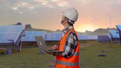 Engineer Working On A Laptop at Energy Farm Stock Footage 331023809