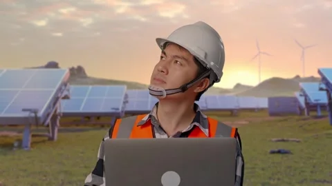 Engineer Working On A Laptop at Energy Farm Stock Footage 331024362