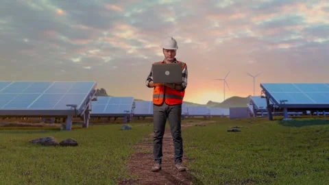 Engineer Working On A Laptop at Energy Farm Stock Footage 331025550