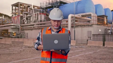 Engineer Working On A Laptop at Gas Plant Stock Footage 337760810