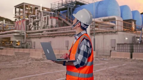 Engineer Working On A Laptop at Gas Plant Stock Footage 337760975