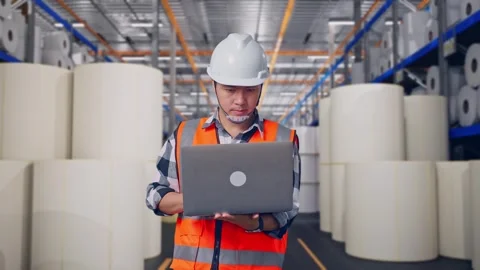 Engineer Working On A Laptop at Polymer Plant Stock Footage 334524531