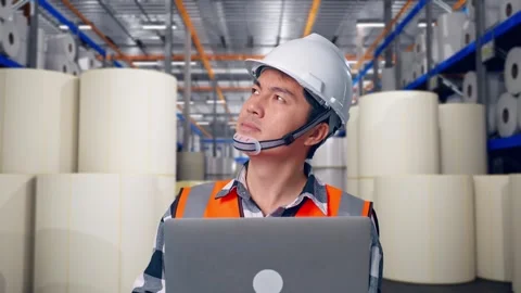 Engineer Working On A Laptop at Polymer Plant Stock Footage 334526190