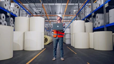 Engineer Working On A Laptop at Polymer Plant Stock Footage 334528647