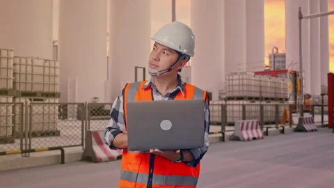 Engineer Working On A Laptop at Storage Facility Stock Footage 335076292