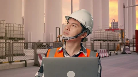 Engineer Working On A Laptop at Storage Facility Stock Footage 335076811