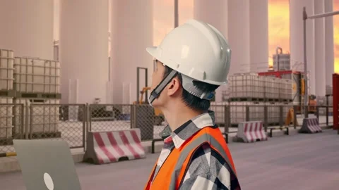 Engineer Working On A Laptop at Storage Facility Stock Footage 335077457