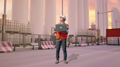 Engineer Working On A Laptop at Storage Facility Stock Footage 335077802