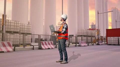 Engineer Working On A Laptop at Storage Facility Stock Footage 335077962