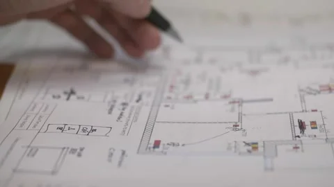 An engineer working with office drawings. Desktop of a designer's office. Men's Stock Footage 262646658