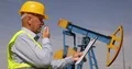 Engineer Working in Oil Extraction Industry Talk to a Handheld Transceiver 4k or 4k+ Resolution