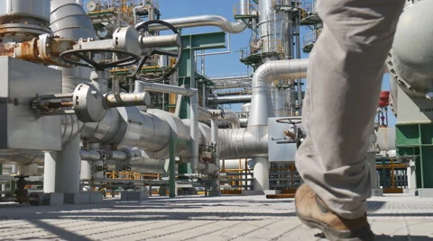 Engineer working in oil refinery plant Stock Footage 68449506