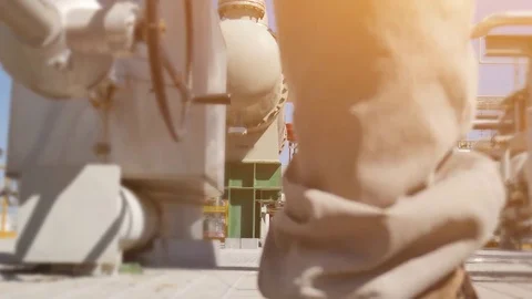Engineer working in petroleum refinery plant Stock Footage 69905692
