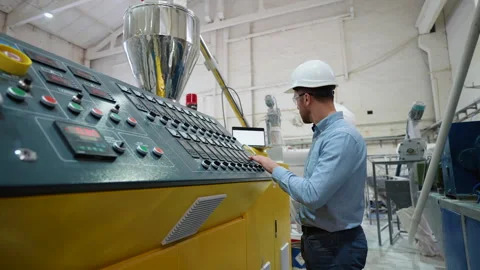 Engineer working at programmable CNC machine in factory industries 스톡 동영상 270104384