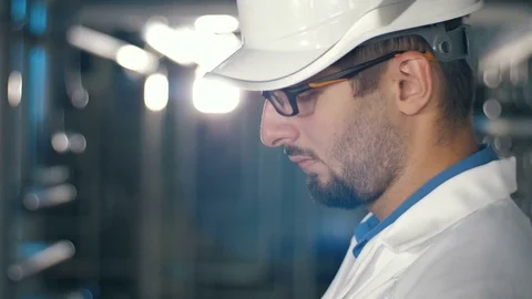 Engineer working on the project Stock Footage 77472365