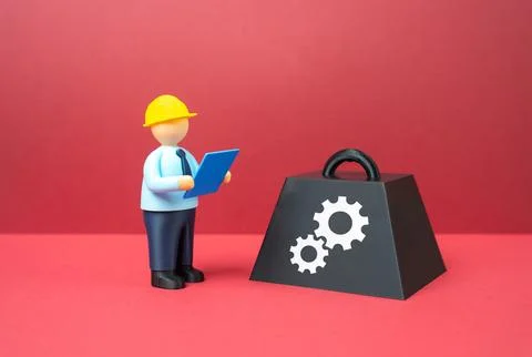 An engineer is working on a solution to a technological problem. Innovation.. Stock Photos