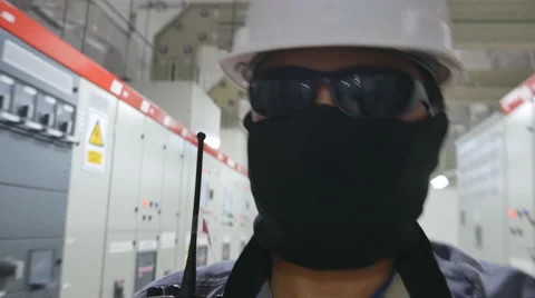 Engineer to working in substation with ppe suit Stock Footage 61522494