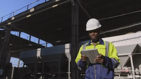 Engineer working with tablet PC near power plant Video stock 114358496