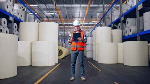 Engineer Working On A Tablet at Polymer Plant Stock Footage 334528378
