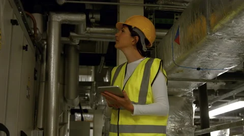 Engineer working in temperature control room Stock-Footage 57647770