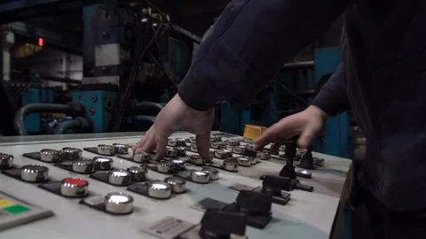 The engineer works with the automated operating console at metallurgical plant. Video stock 84109159
