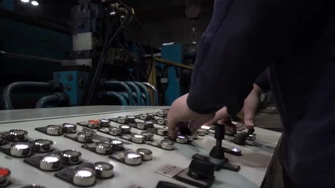The engineer works with the automated operating console at metallurgical plant. Stock Footage 84109490