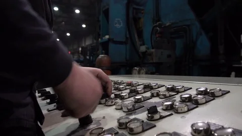 The engineer works with the automated operating console at metallurgical plant. Video stock 84109949