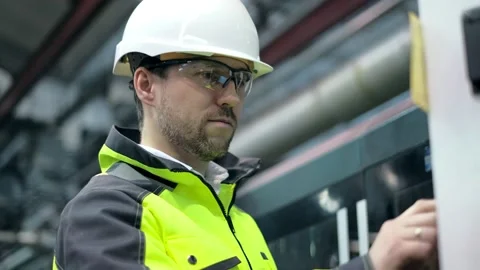 An engineer works at a CNC milling machine. Manufacture of cutting tools. Drill Video stock 171776239