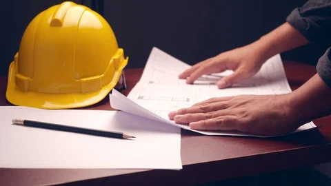 Engineer works in office. Workplace of an architect or designer. Vídeo Stock 125840622