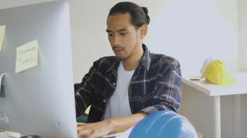 Engineer worried on failed performance on computer monitor Stock Footage 146025780