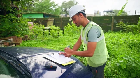Engineer writes and smokes as planning the site Stock Footage 297601451