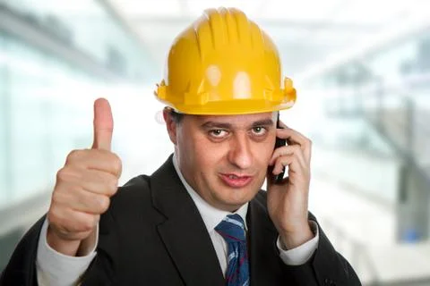 Engineer with yellow hat going thumbs up Stock Photos