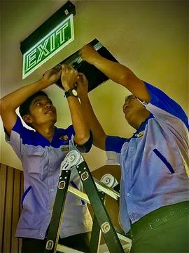 Engineering are fixing the signage Foto stock