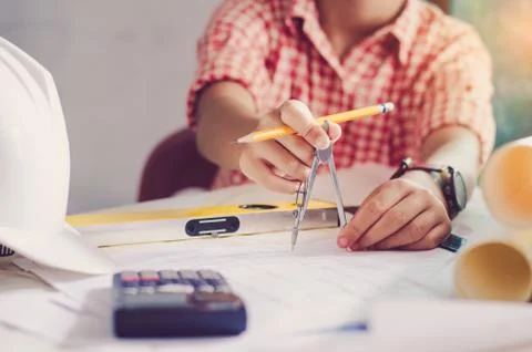 Engineering are working to construction work designed and implemented. Stock Photos