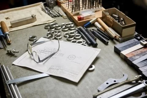 Engineering blueprint and glasses. Stock Photos